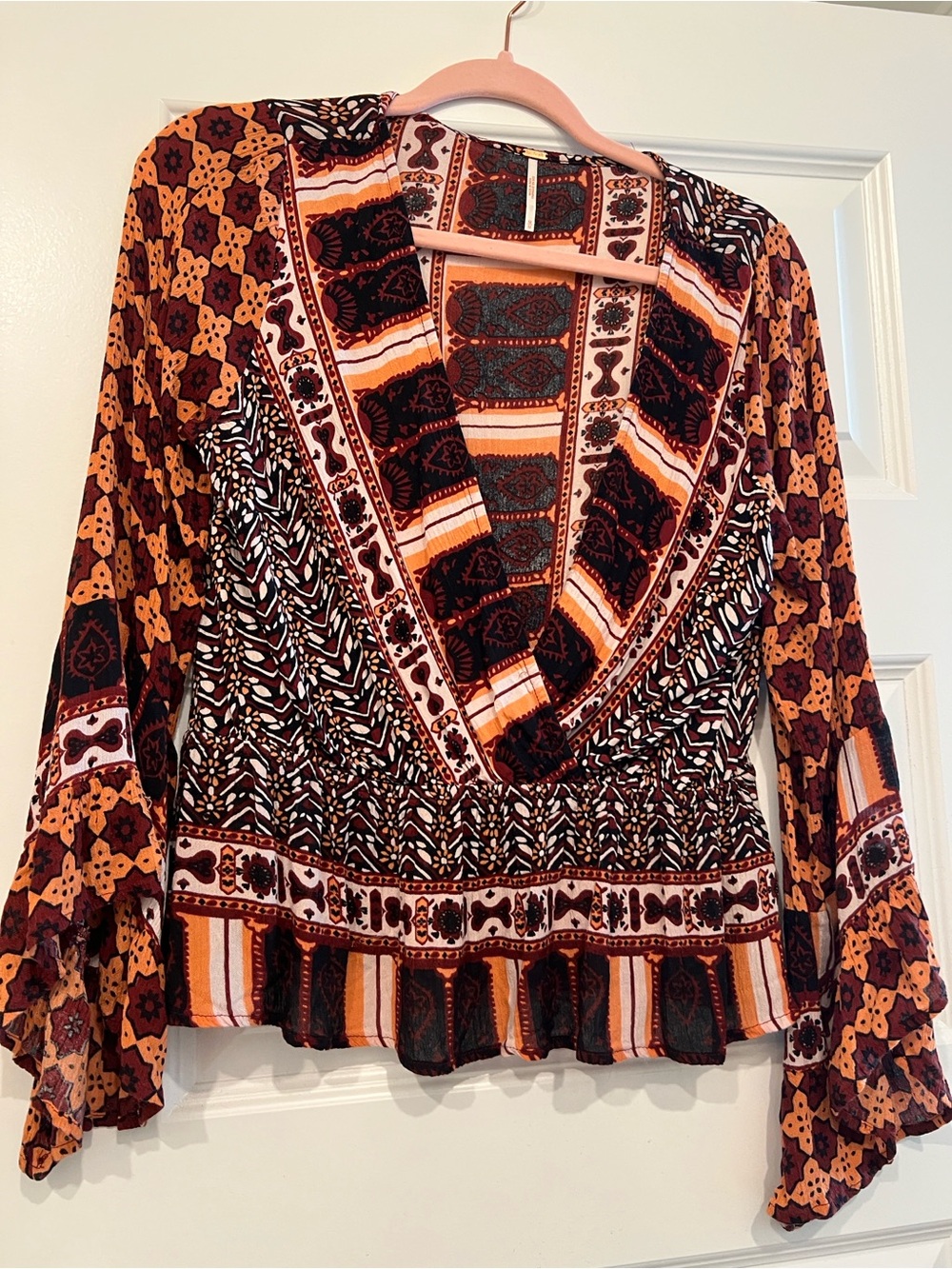 Free People Printed Boho V-Neck Blouse in Rust, Black & Cream